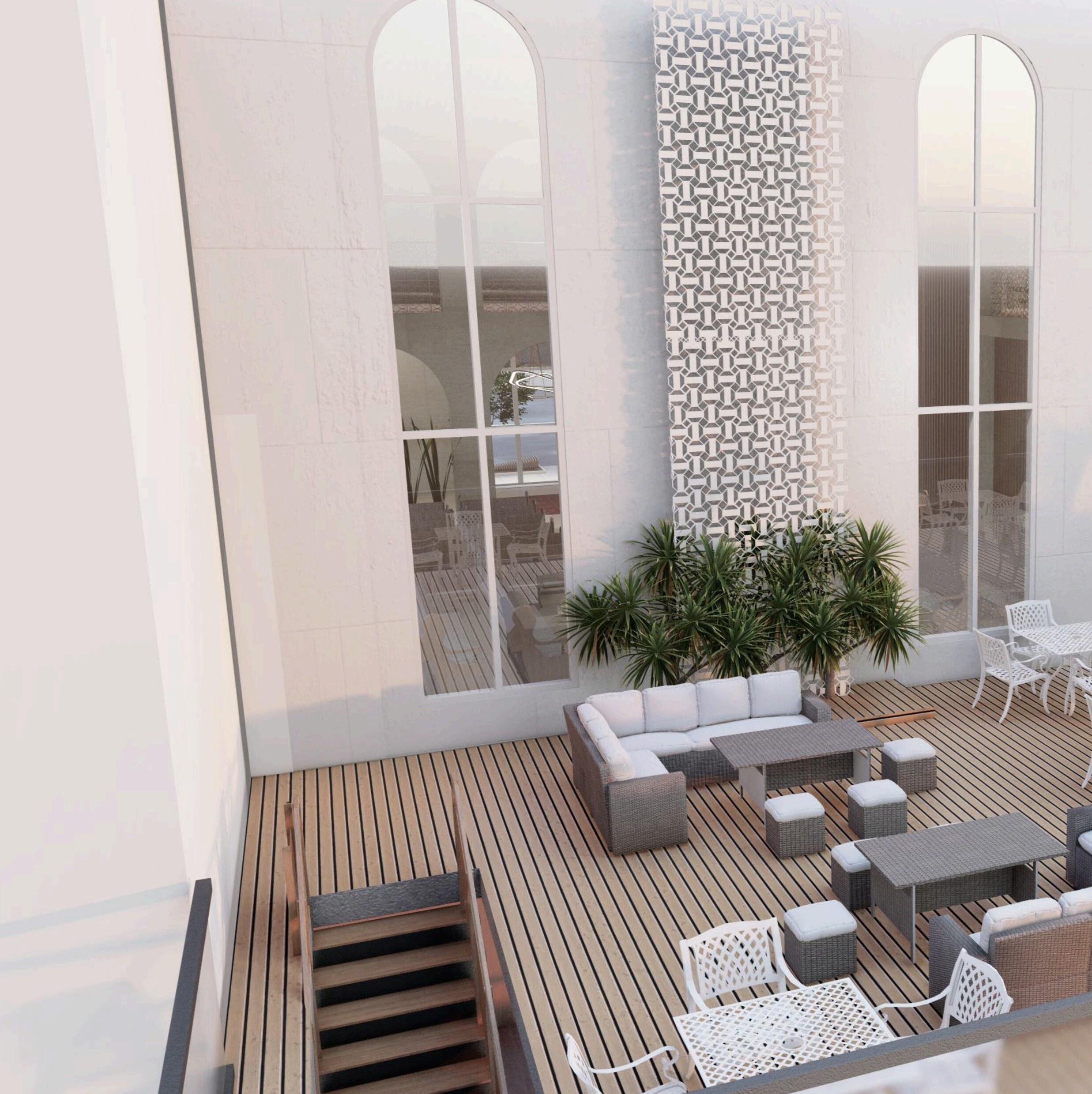 Outdoor terrace with arched windows and mashrabiya screen